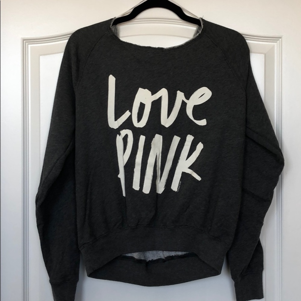 Pink off shoulder sweater.